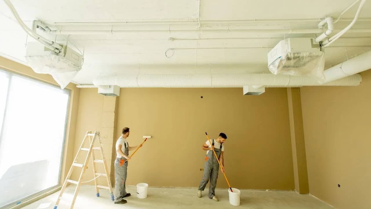 Commercial painter working on a country business or rural commercial space in Dunrobin