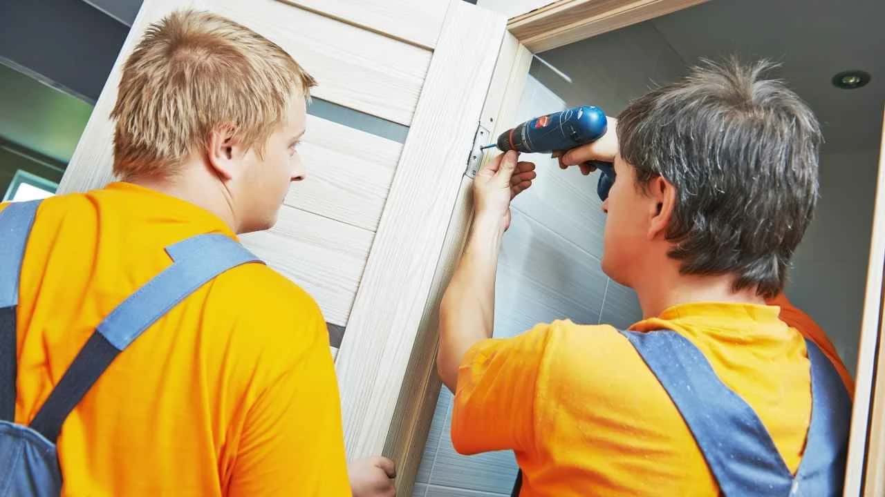 Door installation professional working on a country home near Casselman